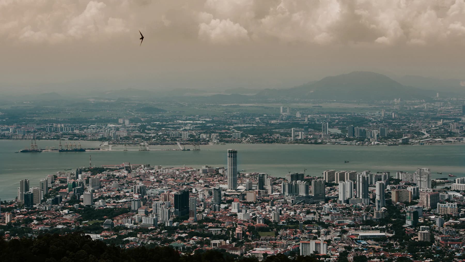 Penang cityscape with hills beyond the urban skyline